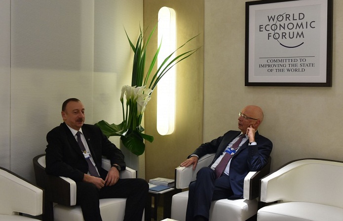 President Ilham Aliyev presented with badge of Davos club of honorary members